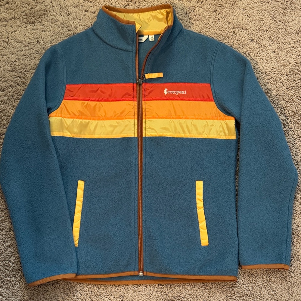 Cotopaxi Blue Fleece Jacket with Vibrant Stripes